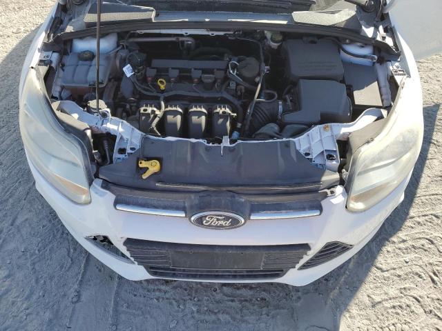Photo 11 from auction – 2014 FORD FOCUS SE with VIN 1FADP3F20EL253581