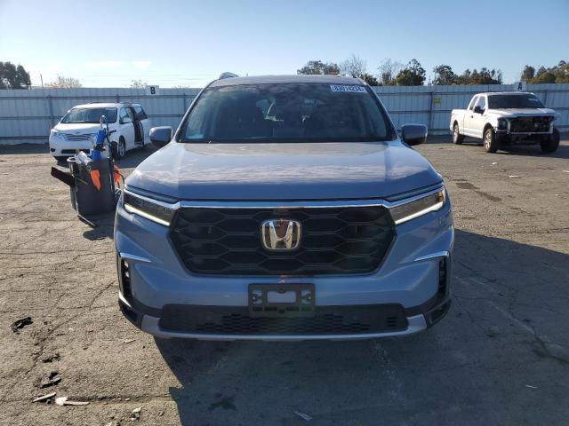 Photo 5 from auction – 2024 HONDA PILOT ELIT with VIN 5FNYG1H89RB022284