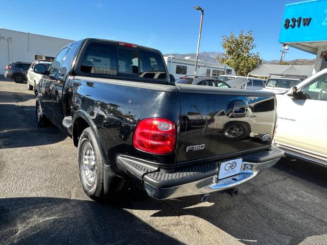 Фото 3 с аукциона – 2000 FORD F150 с VIN 1FTRX07L8YKA69876