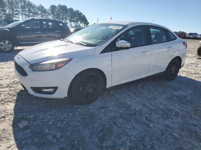 FORD FOCUS SE 2016 with VIN 1FADP3F20GL330176 - Photo from auction