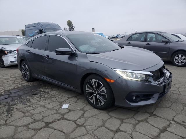 Photo 4 from auction – 2018 HONDA CIVIC EXL with VIN JHMFC1F76JX041963