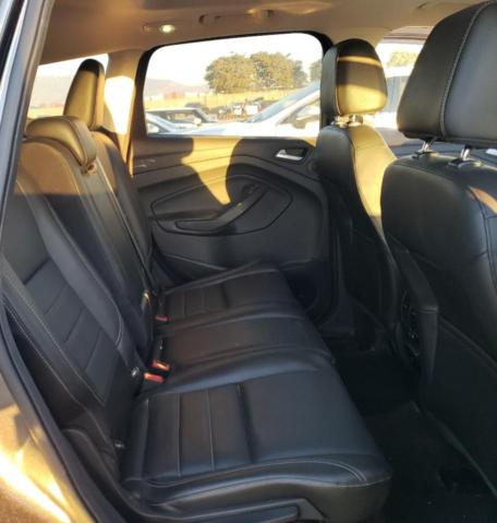 Photo 11 from auction – 2015 FORD ESCAPE TIT with VIN 1FMCU0J90FUA65524