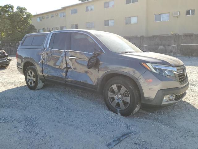Photo 4 from auction – 2020 HONDA RIDGELINE with VIN 5FPYK3F76LB007258
