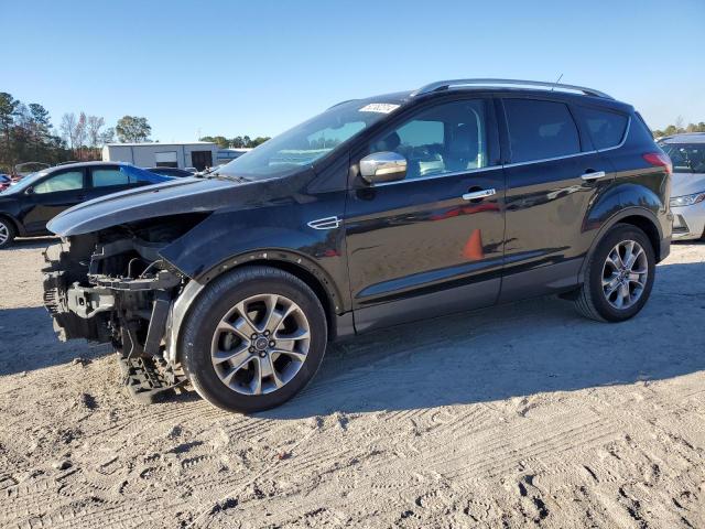 FORD ESCAPE TIT 2014 with VIN 1FMCU0JX2EUD98885 - Photo from auction