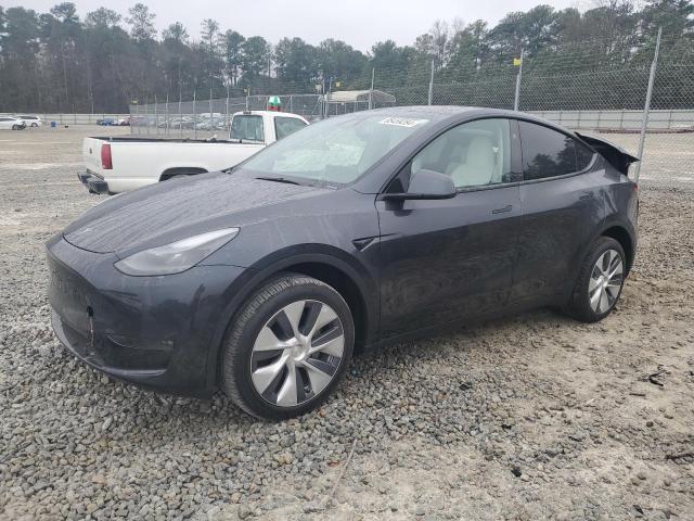 TESLA MODEL Y 2024 with VIN 7SAYGDEEXRA235563 - Photo from auction