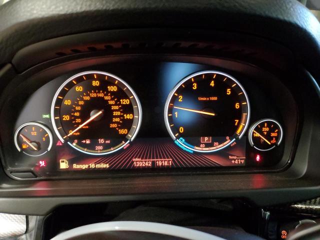 Photo 9 from auction – 2014 BMW X5 XDRIVE5 with VIN 5UXKR6C51E0J71659