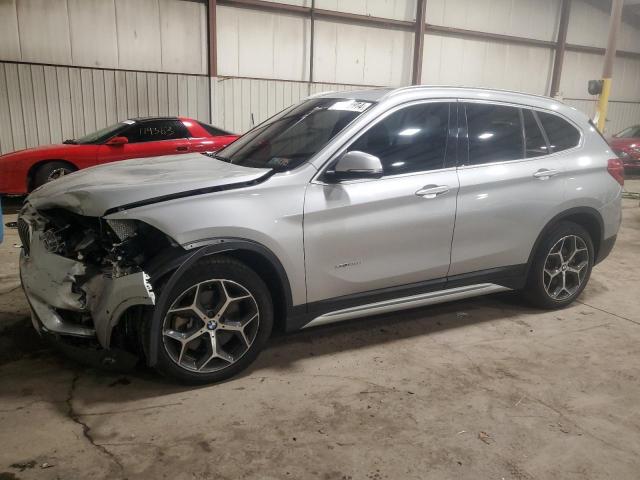 BMW X1 XDRIVE2 2017 with VIN WBXHT3C38H5F76666 - Photo from auction