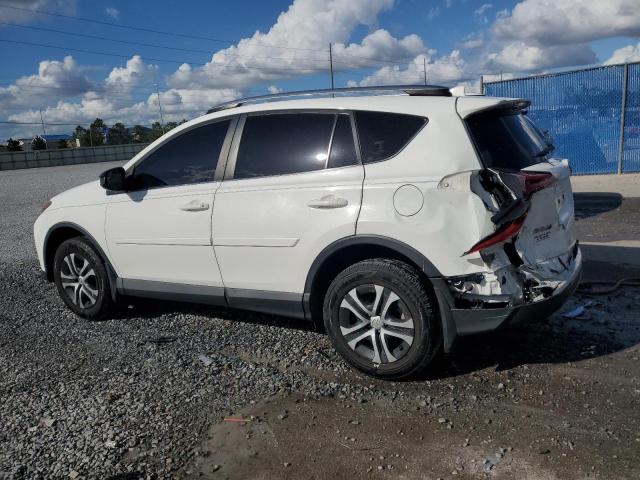 Photo 2 from auction – 2018 TOYOTA RAV4 LE with VIN JTMZFREV7JJ747153