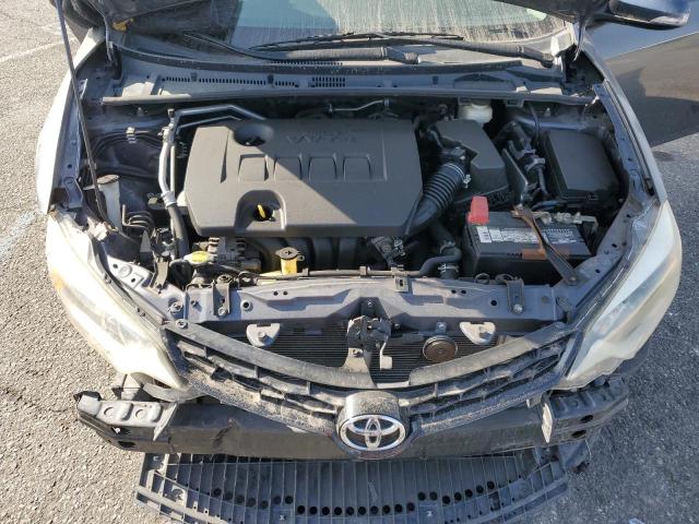 Photo 11 from auction – 2014 TOYOTA COROLLA L with VIN 5YFBURHE5EP013146