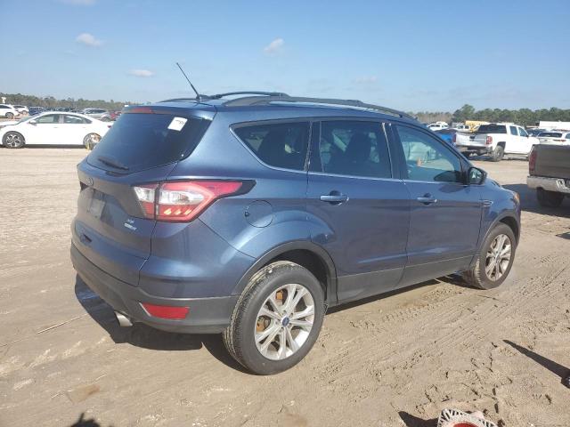 Photo 3 from auction – 2018 FORD ESCAPE SE with VIN 1FMCU9GD4JUC01551