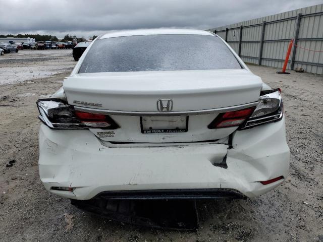 Photo 6 from auction – 2014 HONDA CIVIC LX with VIN 19XFB2F50EE014398