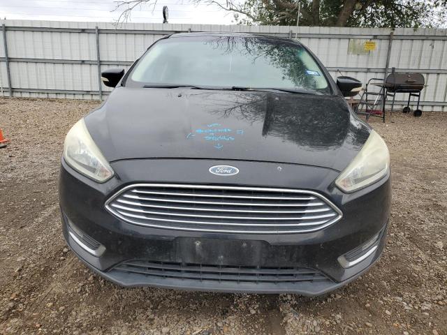 Photo 5 from auction – 2016 FORD FOCUS TITA with VIN 1FADP3N28GL302952