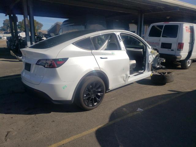 Photo 3 from auction – 2022 TESLA MODEL Y with VIN 7SAYGAEE4NF521288