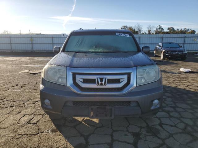 Photo 5 from auction – 2011 HONDA PILOT EXLN with VIN 5FNYF3H72BB034708