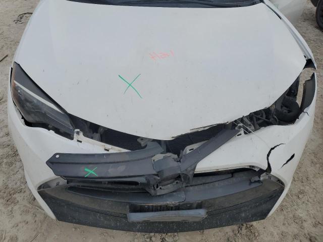 Photo 11 from auction – 2017 TOYOTA COROLLA L with VIN 5YFBURHE9HP658077