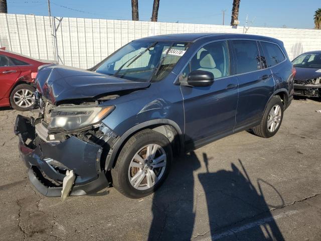 HONDA PILOT LX 2016 with VIN 5FNYF5H10GB034768 - Photo from auction
