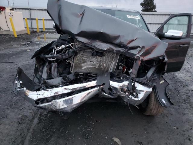 Photo 11 from auction – 2023 RAM 1500 LARAM with VIN 1C6SRFJT7PN637501