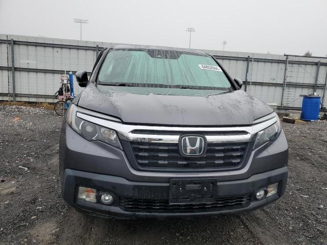 Photo 5 from auction – 2020 HONDA RIDGELINE with VIN 5FPYK3F56LB029923