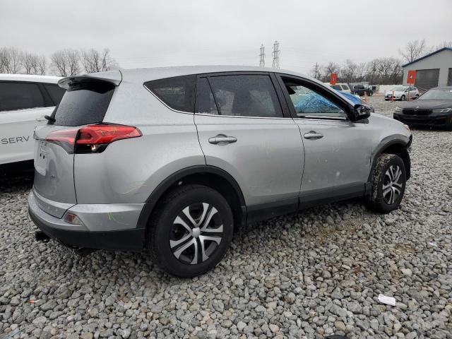 Photo 3 from auction – 2018 TOYOTA RAV4 LE with VIN JTMZFREV4JJ178567