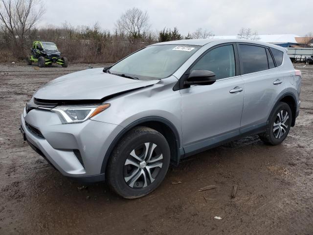 TOYOTA RAV4 LE 2018 with VIN 2T3BFREV1JW784668 - Photo from auction