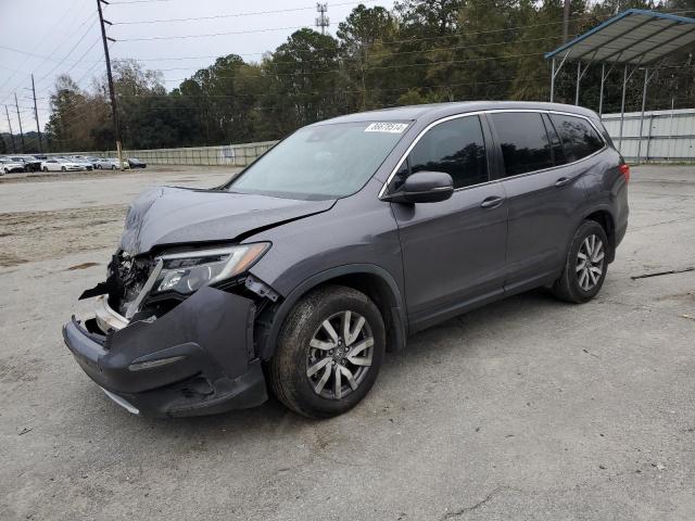 HONDA PILOT EXL 2021 with VIN 5FNYF5H56MB042971 - Photo from auction