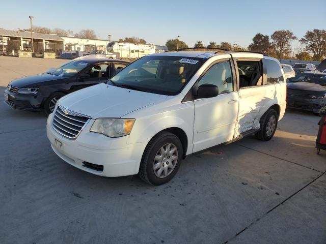 CHRYSLER TOWN & COU 2010 with VIN 2A4RR4DE2AR173790 - Photo from auction
