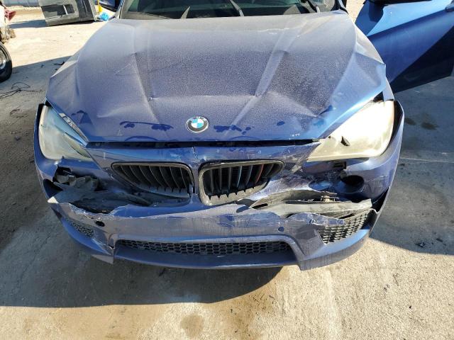 Photo 11 from auction – 2014 BMW X1 XDRIVE3 with VIN WBAVM5C54EVV93089