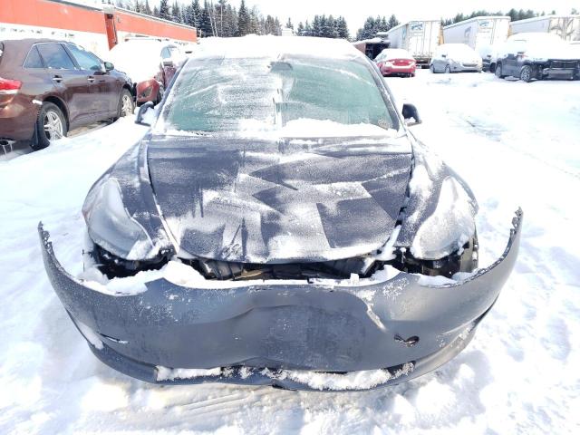 Photo 5 from auction – 2023 TESLA MODEL 3 with VIN LRW3E1FA9PC899953