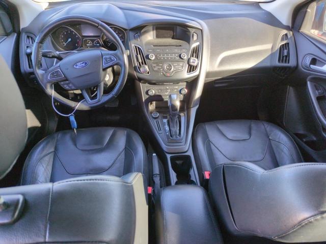 Photo 8 from auction – 2015 FORD FOCUS SE with VIN 1FADP3F29FL331051