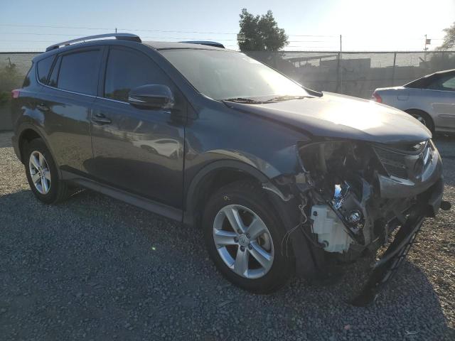 Photo 4 from auction – 2014 TOYOTA RAV4 XLE with VIN JTMWFREV8EJ011105