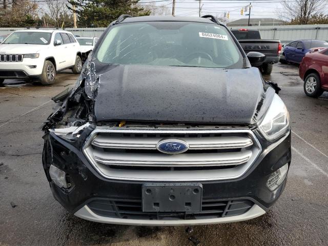 Photo 5 from auction – 2017 FORD ESCAPE SE with VIN 1FMCU9GD6HUC46727