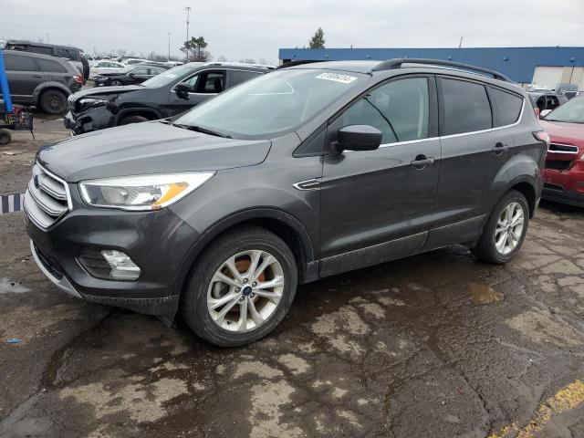 FORD ESCAPE SE 2018 with VIN 1FMCU0GD8JUB52253 - Photo from auction