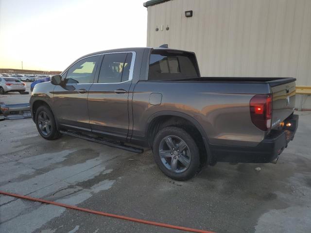 Photo 2 from auction – 2023 HONDA RIDGELINE with VIN 5FPYK3F56PB009726