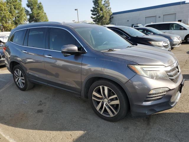 Photo 4 from auction – 2016 HONDA PILOT TOUR with VIN 5FNYF5H96GB016619