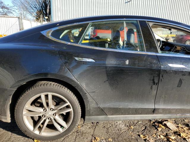 Снимка 10 от търг – 2014 TESLA MODEL S с VIN 5YJSA1H1XEFP44965