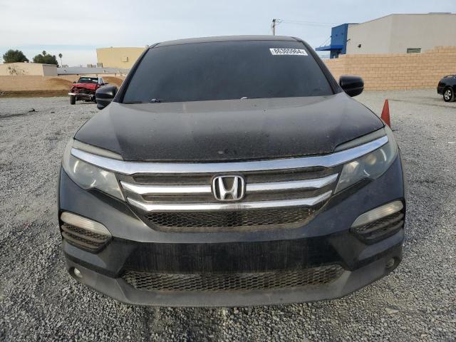 Photo 5 from auction – 2017 HONDA PILOT EXLN with VIN 5FNYF5H77HB003572