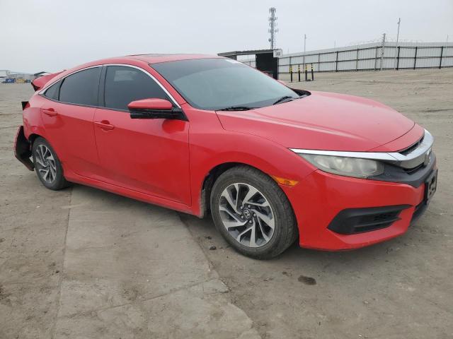Photo 4 from auction – 2016 HONDA CIVIC EX with VIN 2HGFC2F71GH560599