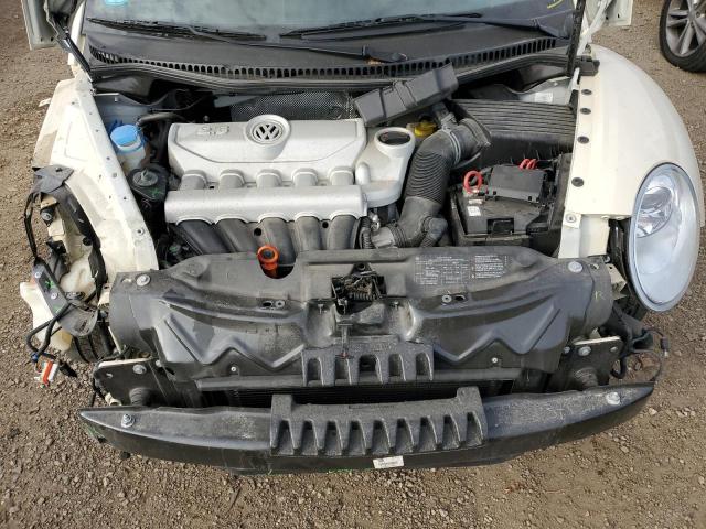 Photo 11 from auction – 2010 VOLKSWAGEN NEW BEETLE with VIN 3VWPW3AG2AM032647