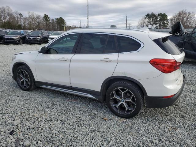 Photo 2 from auction – 2018 BMW X1 XDRIVE2 with VIN WBXHT3C33J5L33849