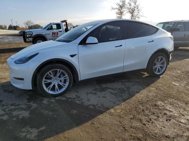 TESLA MODEL Y 2023 with VIN 7SAYGDEE6PF687056 - Photo from auction