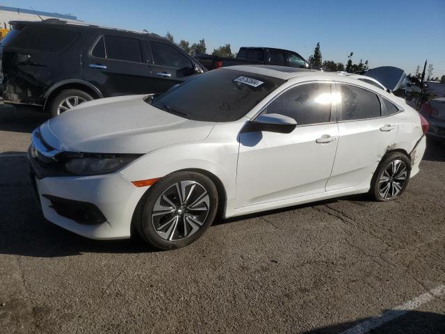 HONDA CIVIC EX 2017 with VIN 2HGFC1F30HH643157 - Photo from auction