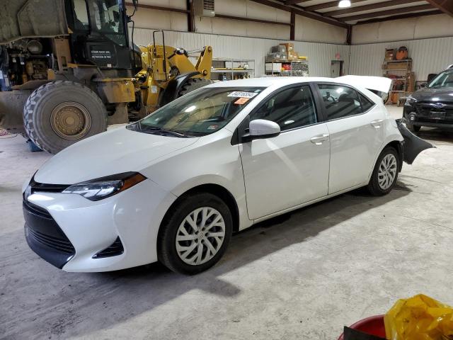 TOYOTA COROLLA L 2018 with VIN 5YFBURHE6JP810385 - Photo from auction