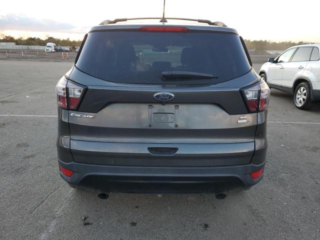 Photo 6 from auction – 2018 FORD ESCAPE SE with VIN 1FMCU9GD3JUA46457
