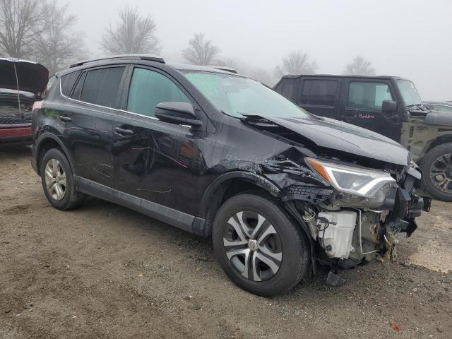 Photo 4 from auction – 2018 TOYOTA RAV4 LE with VIN 2T3BFREV0JW756294