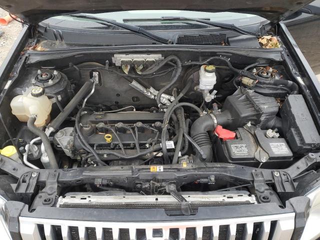 Photo 11 from auction – 2009 MERCURY MARINER with VIN 4M2CU81759KJ06063