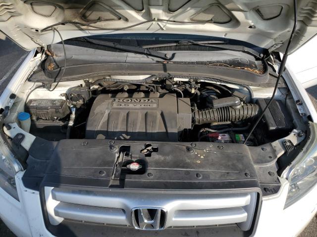 Photo 12 from auction – 2006 HONDA PILOT EX with VIN 2HKYF18736H562821
