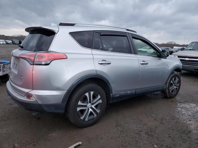 Photo 3 from auction – 2018 TOYOTA RAV4 LE with VIN JTMBFREV9JJ201147
