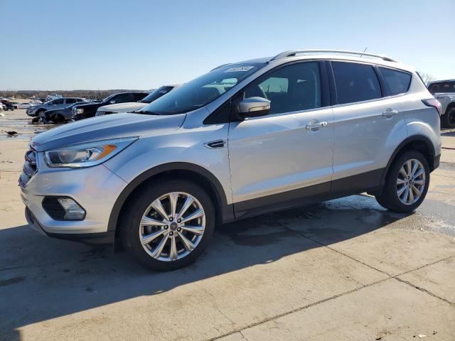 FORD ESCAPE TIT 2017 with VIN 1FMCU0J94HUD94665 - Photo from auction