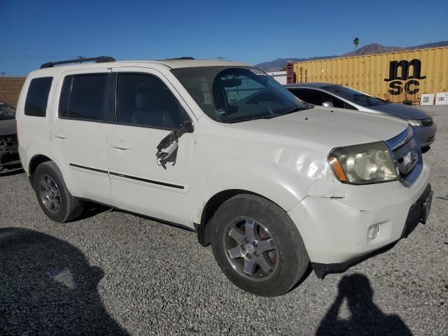 Photo 4 from auction – 2011 HONDA PILOT TOUR with VIN 5FNYF3H94BB014302
