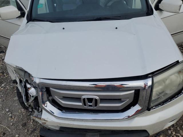 Photo 12 from auction – 2011 HONDA PILOT TOUR with VIN 5FNYF4H9XBB058357